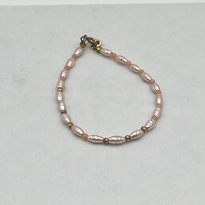 LOT 84J: Collection of Bracelets and Pins