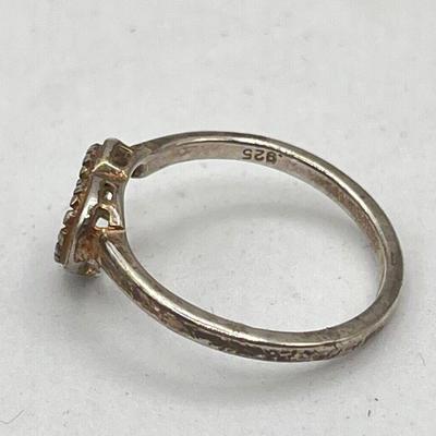 LOT 90J: Sterling Silver Jewelry - Two Size 6 Rings and "Believe" Cross Pendant