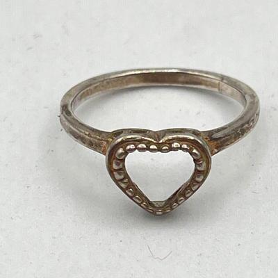 LOT 90J: Sterling Silver Jewelry - Two Size 6 Rings and "Believe" Cross Pendant