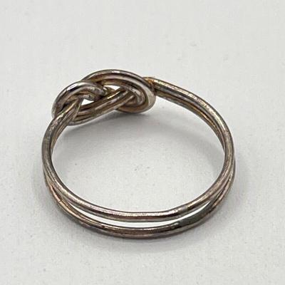 LOT 90J: Sterling Silver Jewelry - Two Size 6 Rings and "Believe" Cross Pendant