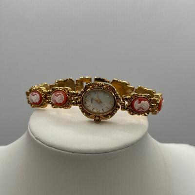 LOT 94J: Gold Tone Necklaces and More