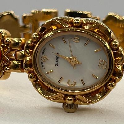 LOT 94J: Gold Tone Necklaces and More