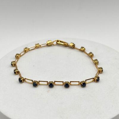 LOT 95J: Gold Tone Bracelets and Earrings