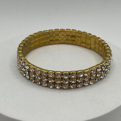 LOT 95J: Gold Tone Bracelets and Earrings