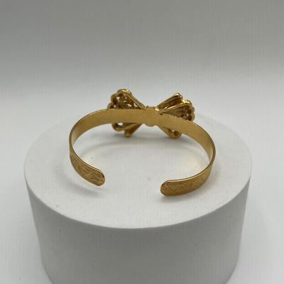LOT 95J: Gold Tone Bracelets and Earrings