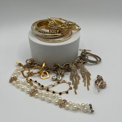 LOT 95J: Gold Tone Bracelets and Earrings