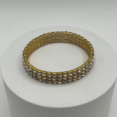 LOT 95J: Gold Tone Bracelets and Earrings