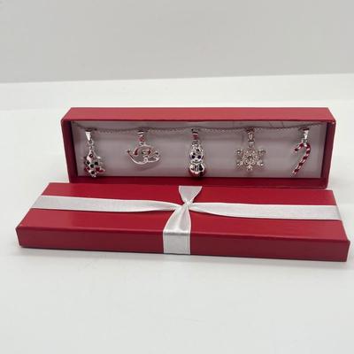 LOT 143J: Christmas Themed Avon Jewelry in Original Boxes