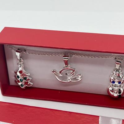 LOT 143J: Christmas Themed Avon Jewelry in Original Boxes