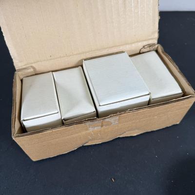 LOT 198D: Christmas Gifts & Home Decor - Avon, Homco Denim Days Santa, Lenox, Norman Rockwell & More