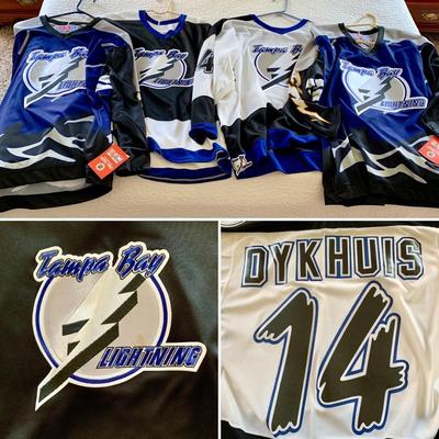 LOT 208 M: Tampa Bay Lightning Hockey Jersey's: 2 Semi-Pro Jerseys w/ Tags Size Medium, Karl Dykhuis #14 Size Medium, & More