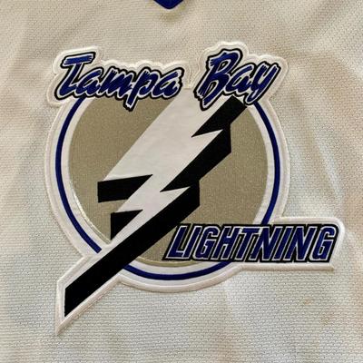 LOT 208 M: Tampa Bay Lightning Hockey Jersey's: 2 Semi-Pro Jerseys w/ Tags Size Medium, Karl Dykhuis #14 Size Medium, & More
