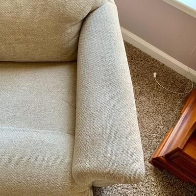 LOT 213 M: Tan Rocking Recliner