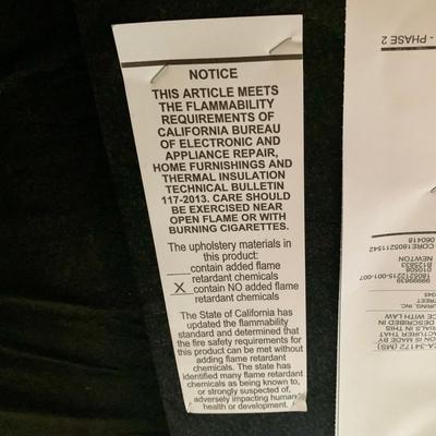 LOT 213 M: Tan Rocking Recliner