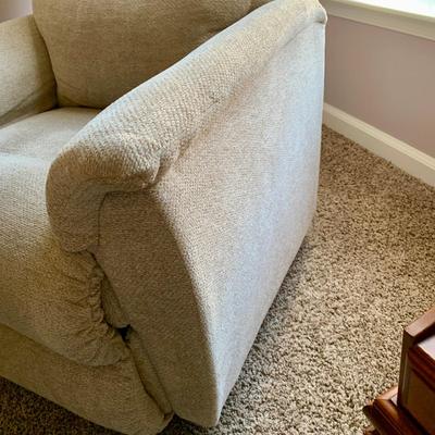 LOT 213 M: Tan Rocking Recliner