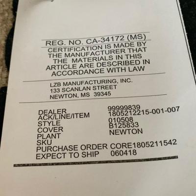 LOT 213 M: Tan Rocking Recliner