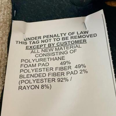 LOT 213 M: Tan Rocking Recliner