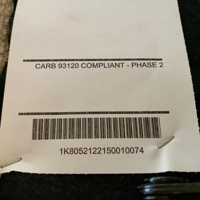 LOT 213 M: Tan Rocking Recliner