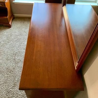 LOT 218 M: Taylor Jamestown Cherry Wood Bedroom Set: 7 Drawer Chest Of Drawers, Two 2 Drawer Bedside Tables, 10 Drawer Dresser w/ Mirror,...