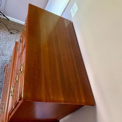 LOT 218 M: Taylor Jamestown Cherry Wood Bedroom Set: 7 Drawer Chest Of Drawers, Two 2 Drawer Bedside Tables, 10 Drawer Dresser w/ Mirror,...