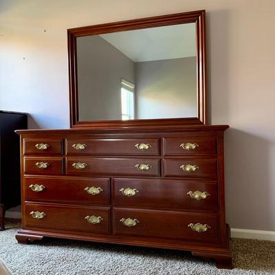 LOT 218 M: Taylor Jamestown Cherry Wood Bedroom Set: 7 Drawer Chest Of Drawers, Two 2 Drawer Bedside Tables, 10 Drawer Dresser w/ Mirror,...