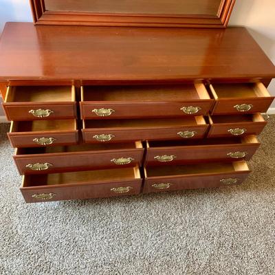 LOT 218 M: Taylor Jamestown Cherry Wood Bedroom Set: 7 Drawer Chest Of Drawers, Two 2 Drawer Bedside Tables, 10 Drawer Dresser w/ Mirror,...