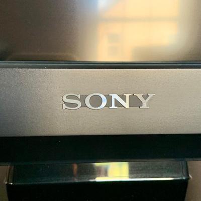 LOT 219 M: Sony Bravia LCD TV Model #KDL-32L5000, LG DVD Player Model #DN191H, & Lazy Susan Top TV Stand Cabinet