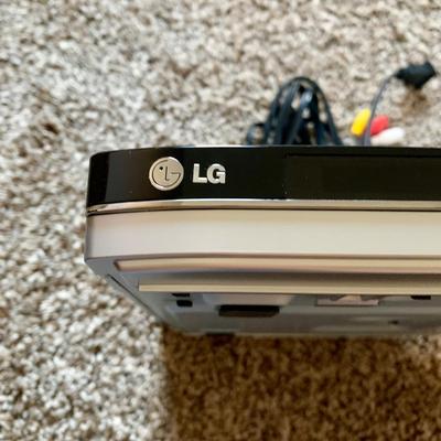 LOT 219 M: Sony Bravia LCD TV Model #KDL-32L5000, LG DVD Player Model #DN191H, & Lazy Susan Top TV Stand Cabinet