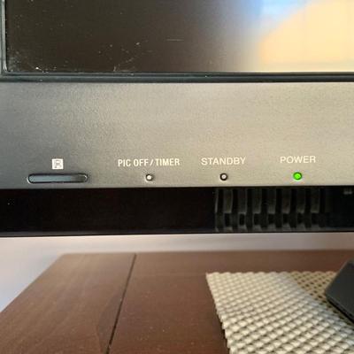 LOT 219 M: Sony Bravia LCD TV Model #KDL-32L5000, LG DVD Player Model #DN191H, & Lazy Susan Top TV Stand Cabinet