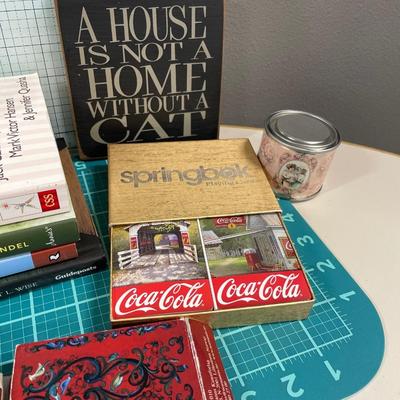 Cat decor, books, cards and “can”dle