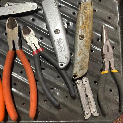 Snippers, leather man tools and carpet knives
