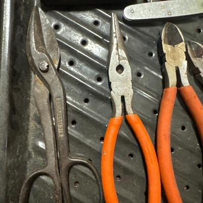 Snippers, leather man tools and carpet knives