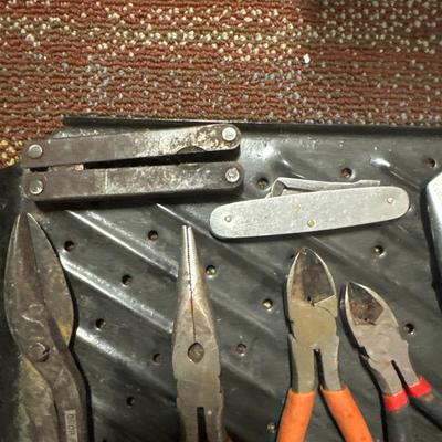 Snippers, leather man tools and carpet knives