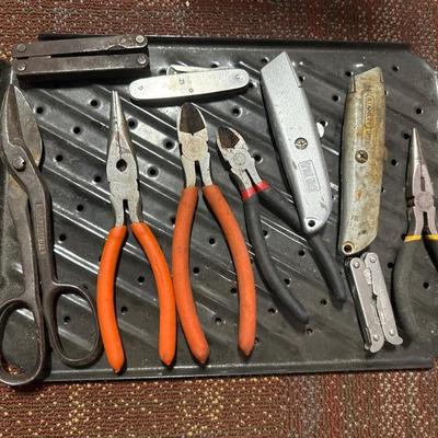 Snippers, leather man tools and carpet knives