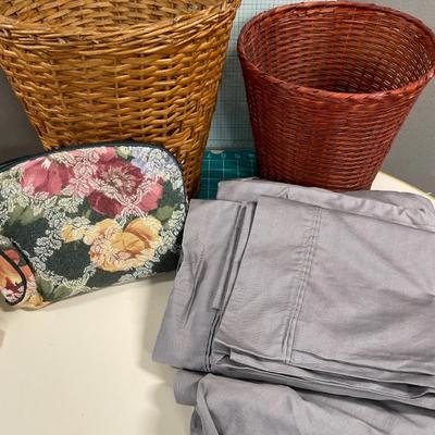 Wicker baskets, sheets and cosmetic bags