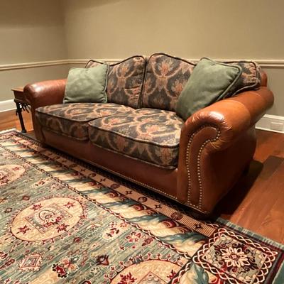 Howard Miller WoodMark Originals Leather And Upholstered Sofa, Chair, And Ottoman