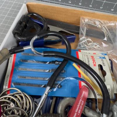 Garage Lot: Saw Blade, Sharpening Stone,  Sprinkler etc. 