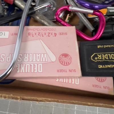 Garage Lot: Saw Blade, Sharpening Stone,  Sprinkler etc. 