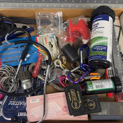 Garage Lot: Saw Blade, Sharpening Stone,  Sprinkler etc. 