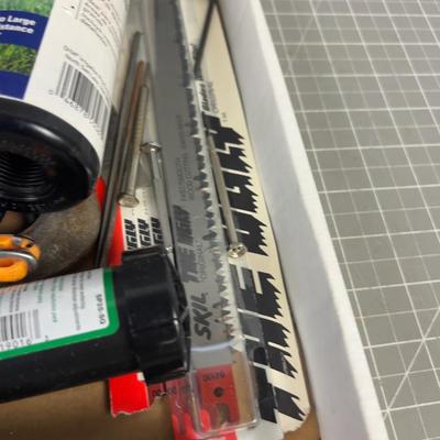 Garage Lot: Saw Blade, Sharpening Stone,  Sprinkler etc. 