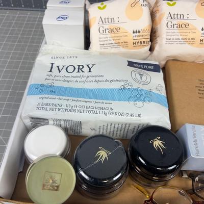 Makeup, Face Cream and Mini Pads, Feminine things; Essential oils too.