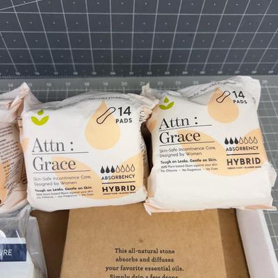 Makeup, Face Cream and Mini Pads, Feminine things; Essential oils too.