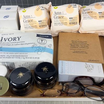 Makeup, Face Cream and Mini Pads, Feminine things; Essential oils too.