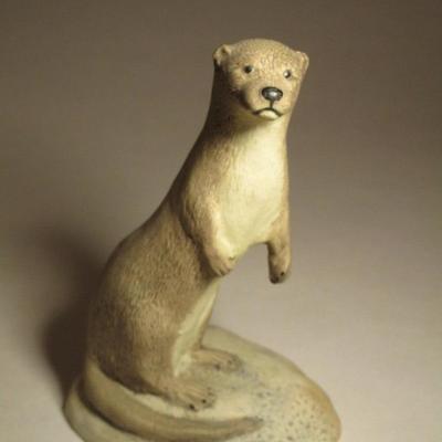 Bisque porcelain otter figurine
