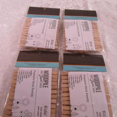 4 pkg. Woodpile Fun wooden clothespins, 24 in ea. pkg