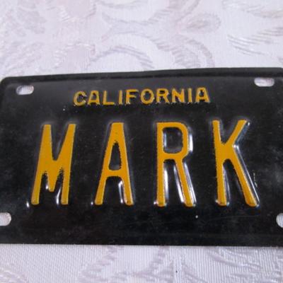 Sale Photo Thumbnail #443: 2-1/4" x 4", license plate has "Mark"