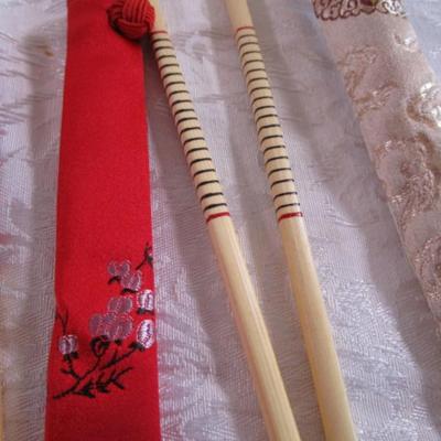 2 sets of chopsticks in cases