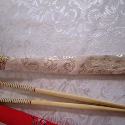 2 sets of chopsticks in cases