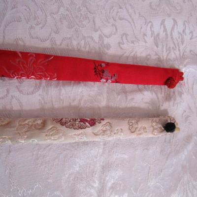 2 sets of chopsticks in cases