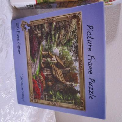1 Picture Frame puzzle, 1 Siene Sunset puzzle, 1 Debbie Mumm puzzle